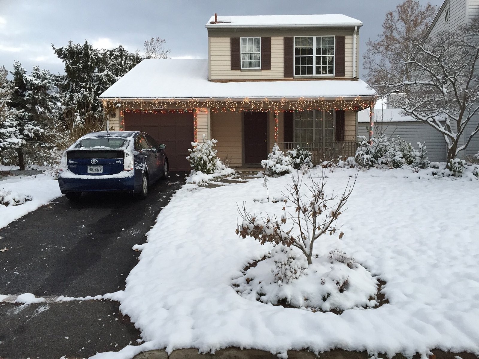 Suburban house in the morning with the driveway cleared