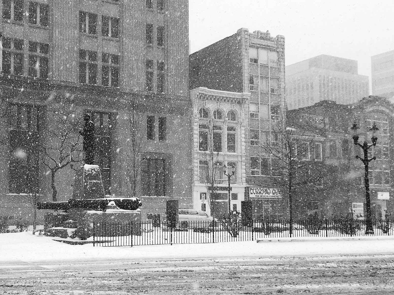 Downtown Hamilton in falling snow, mid-afternoon
