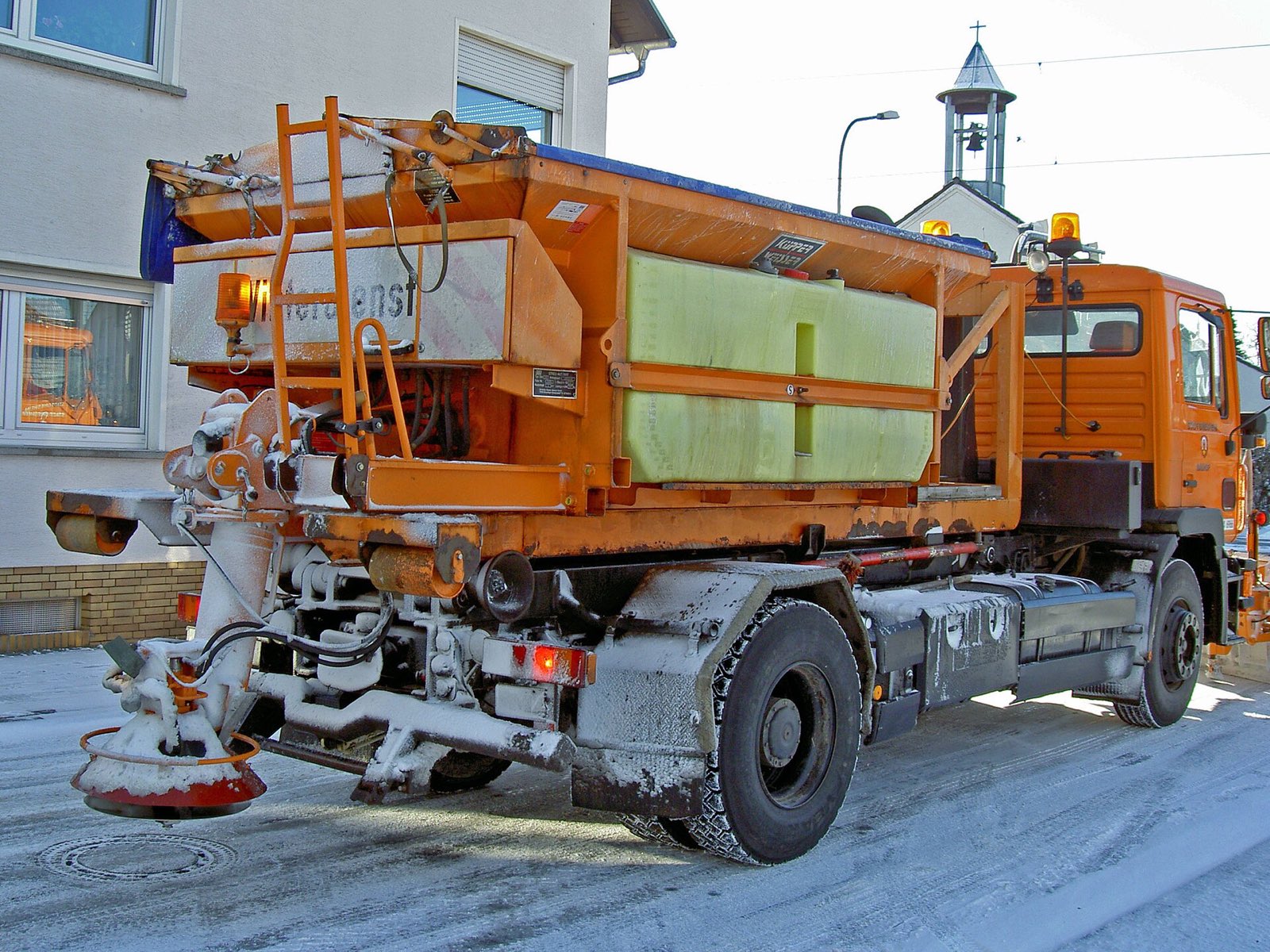 Orange salt and brine truck ready to roll